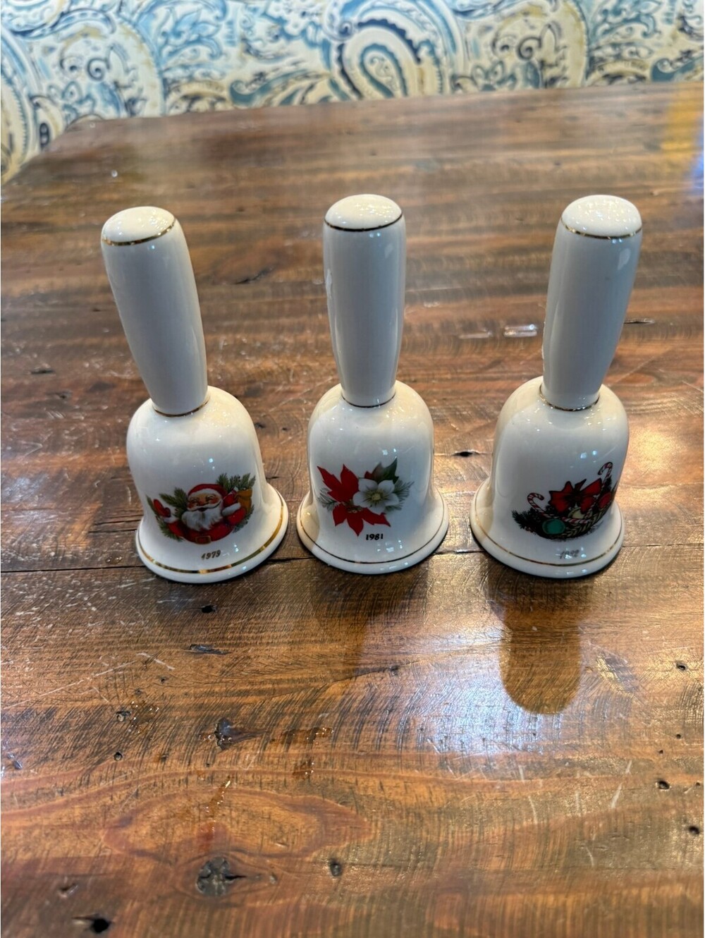 Vintage Porcelain Christmas Bells Set with Santa Claus and Poinsettia Designs